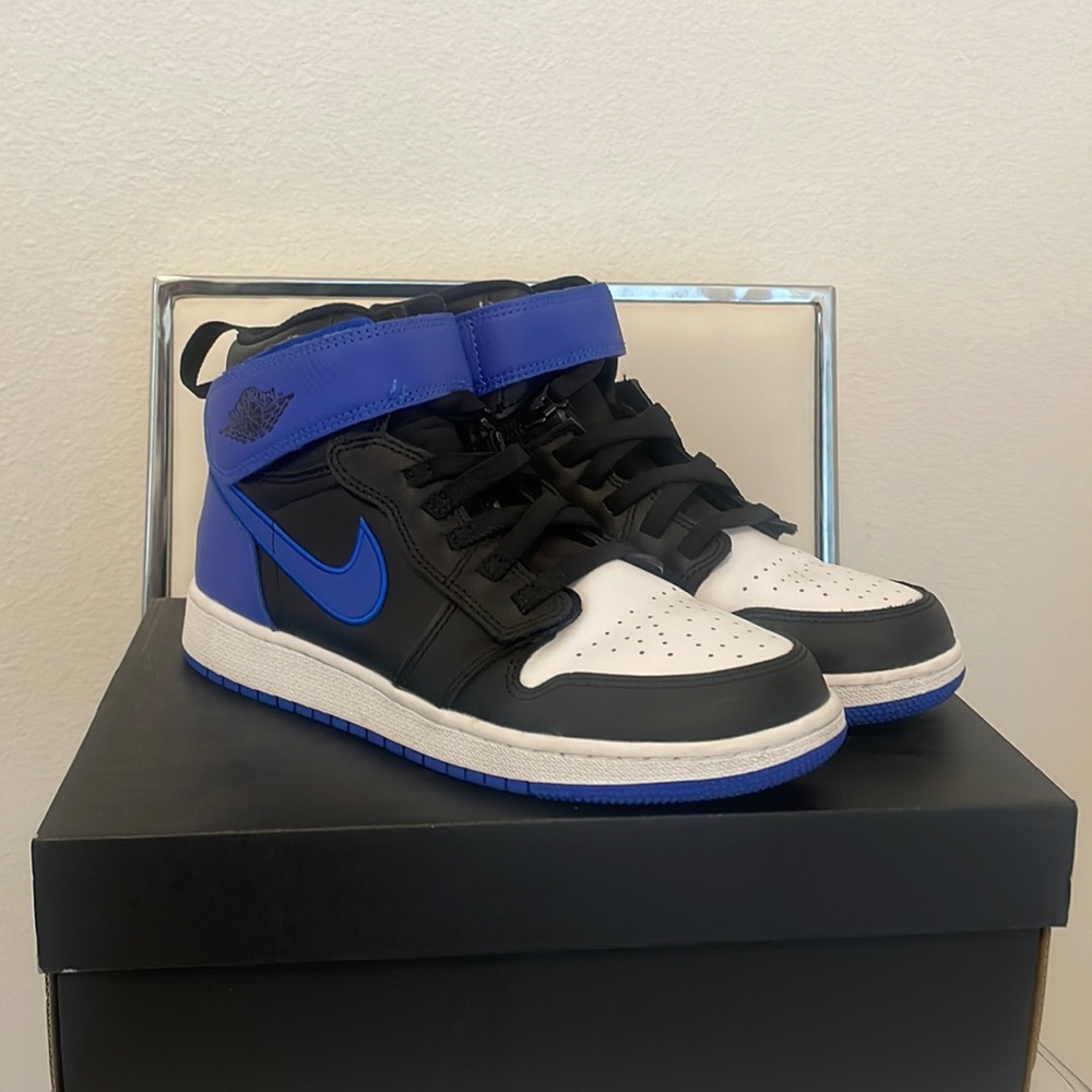 Jordan’s- size: 7, color: blue black and white, condition: worn once.